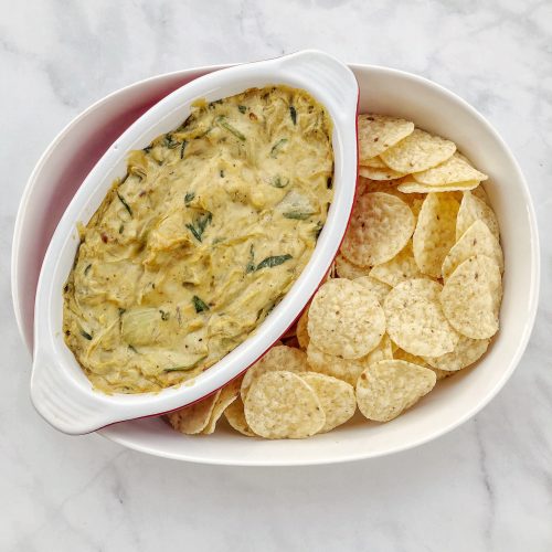 Vegan Spinach Artichoke Dip is dairy-free, egg-free, and gluten-free. Perfect for parties!