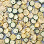 Crispy Baked Zucchini and Squash make a great summer snack or side dish! Combine veggies with Panko, olive oil, salt and pepper, then roast for 30 minutes