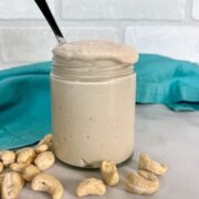 vegan sour cream in jar with cashews.