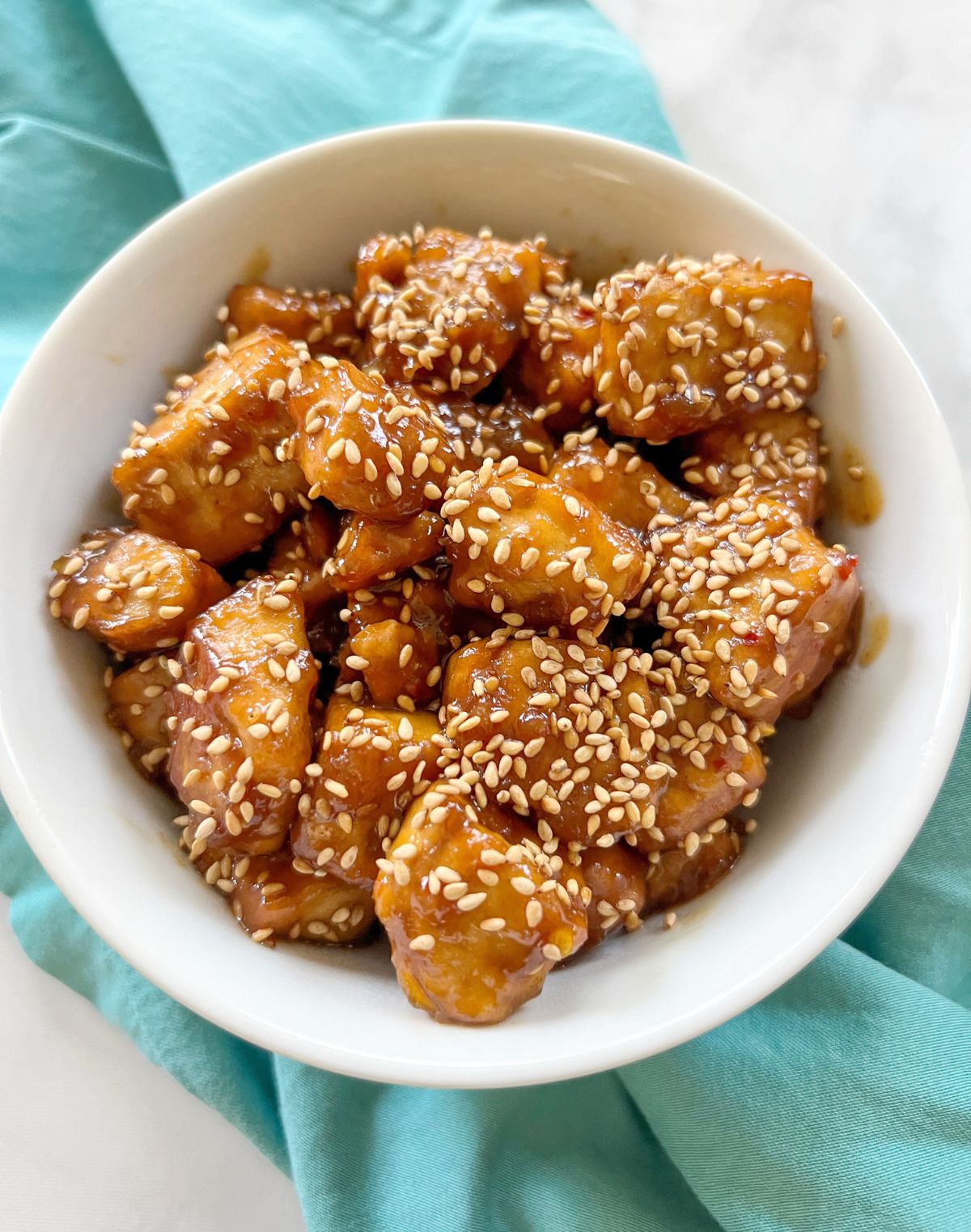 general tsos tofu with sesame seeds.