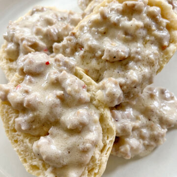 dairy free biscuits and sausage gravy on plate.