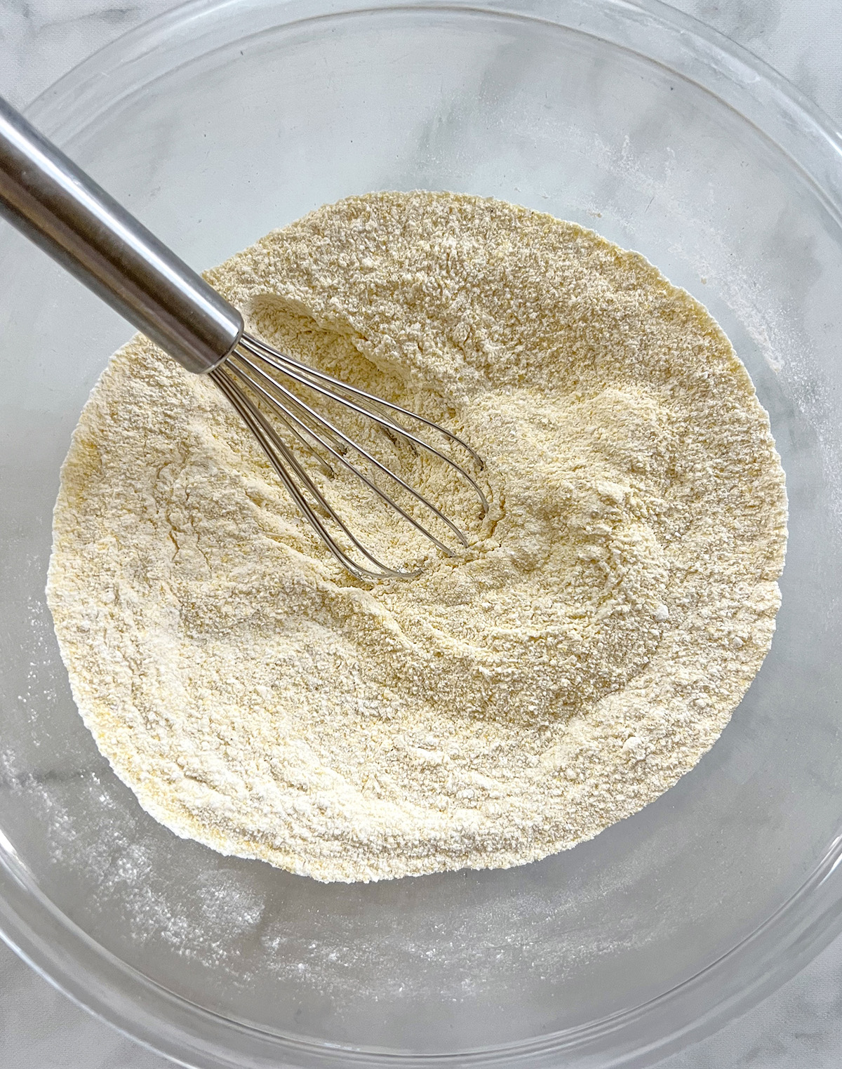 vegan homemade cornbread muffins dry ingredients in bowl