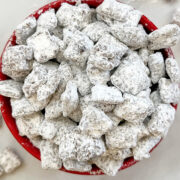 dairy free puppy chow in red serving bowl.