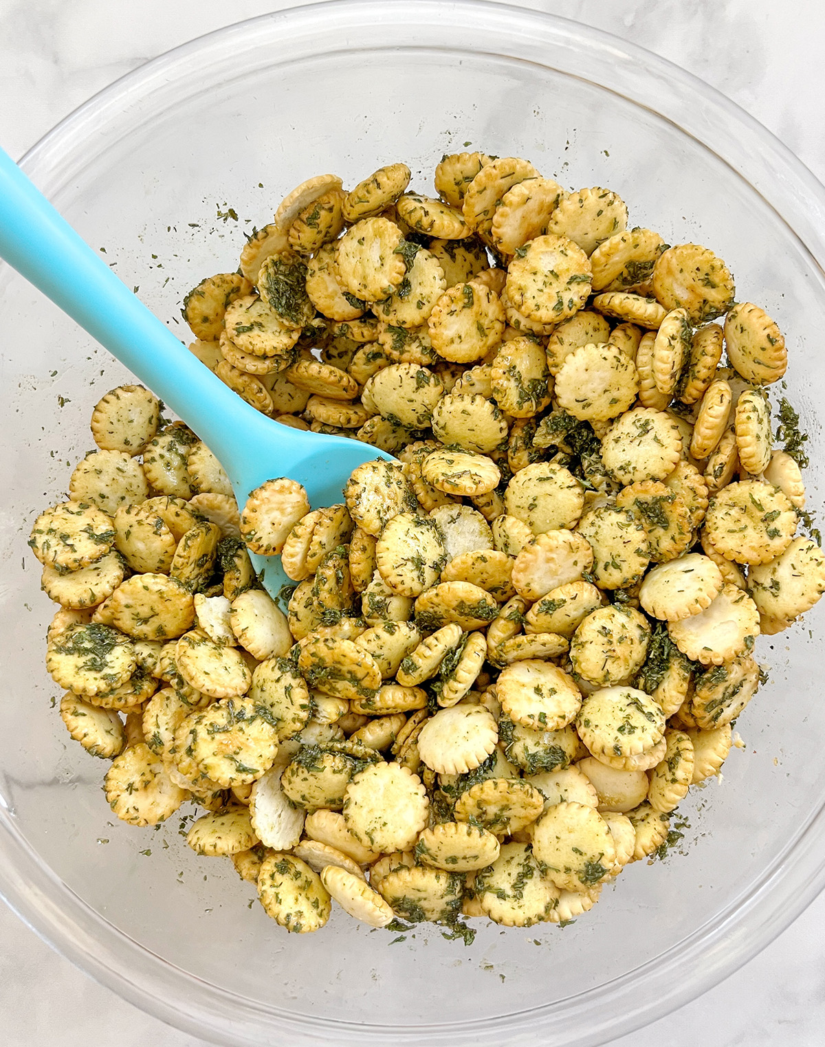 dairy free ranch oyster crackers in mixing bowl.