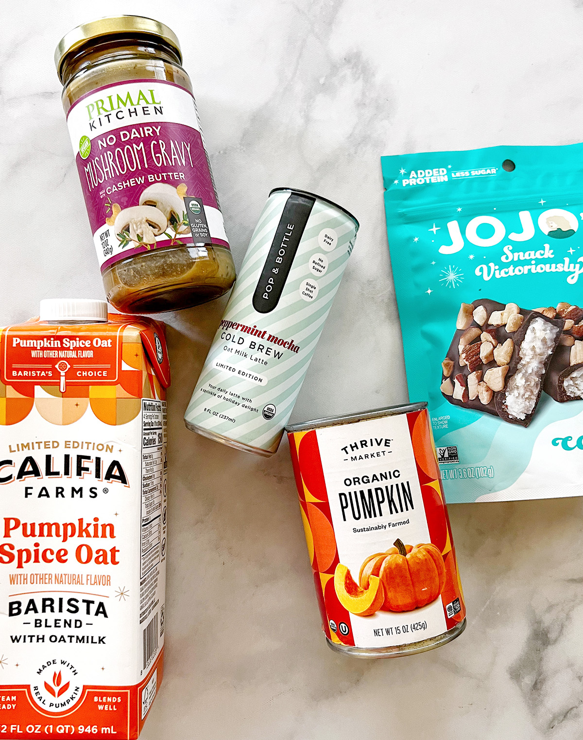 Seasonal Thrive Market items including pumpkin spice oat milk, cold brew, and vegan snacks