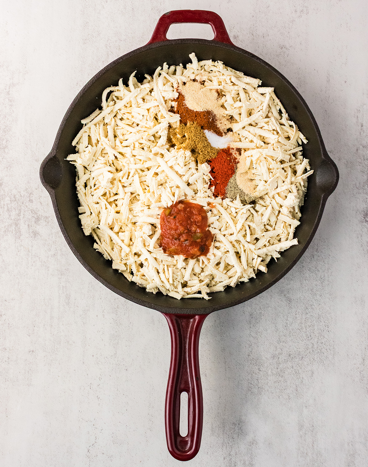 crumbled tofu tacos cooking in a skillet