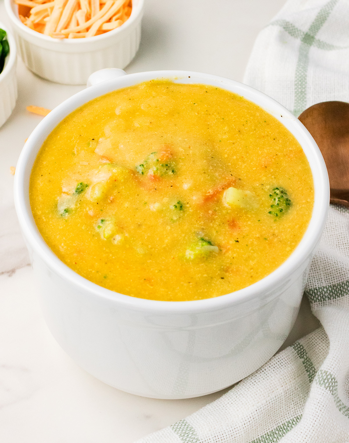 creamy vegan broccoli cheese soup in bowl