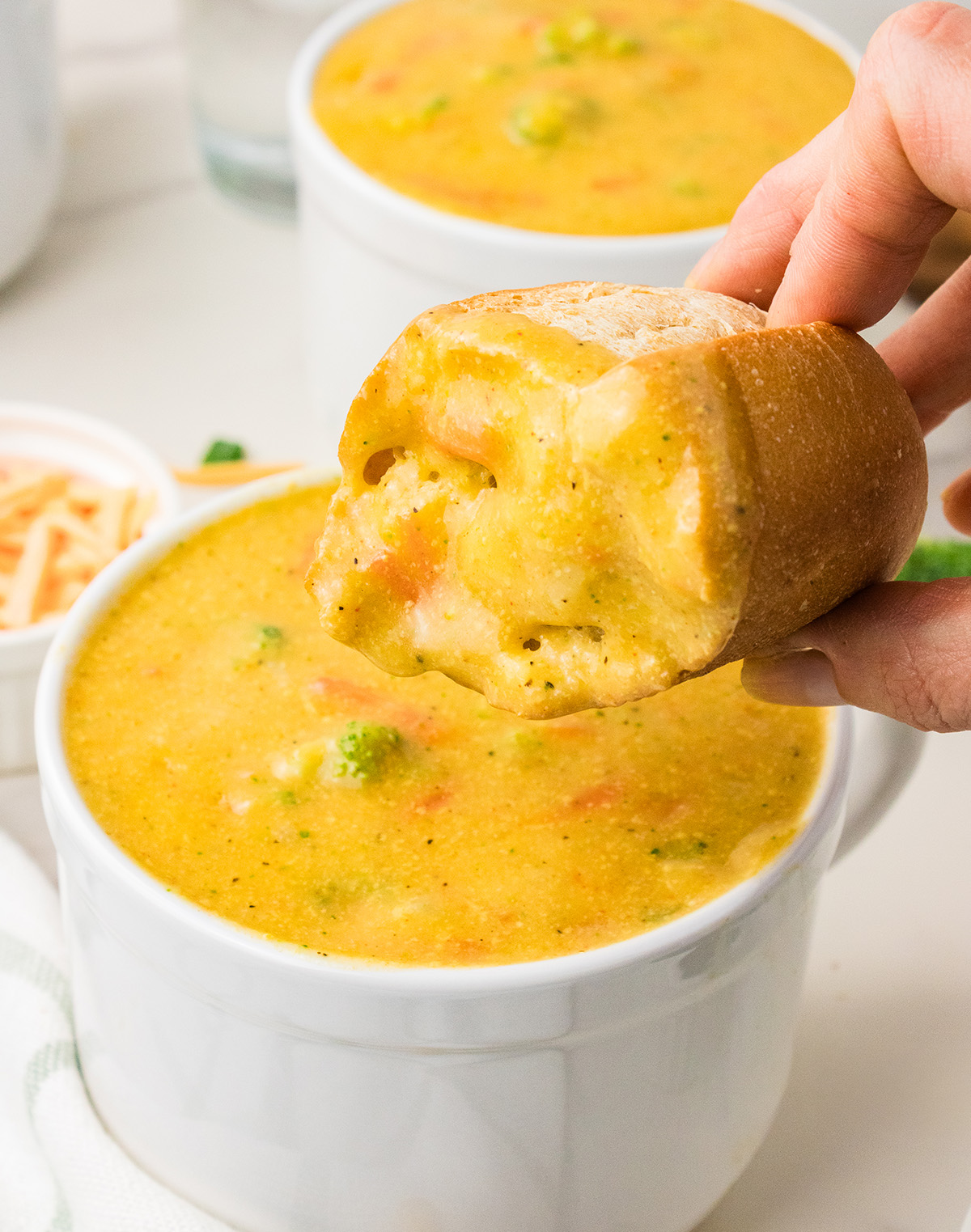 vegan broccoli cheddar soup with dinner roll